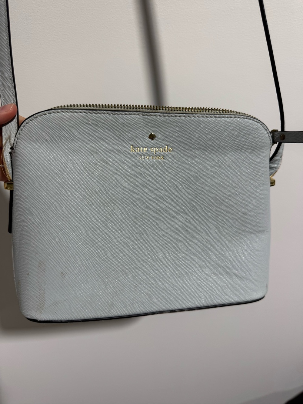 kate spade light blue crossbody purse with gold logo